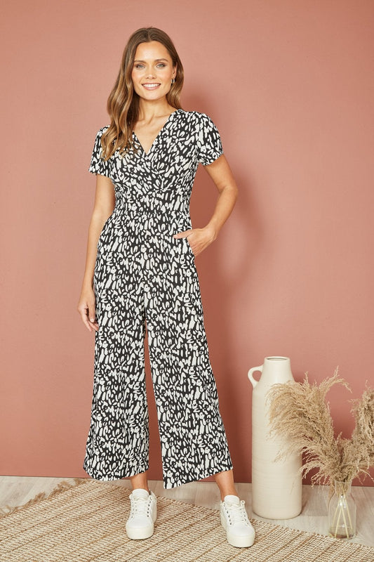 Mela Black And White Wrap Over Stretch Jumpsuit Mela