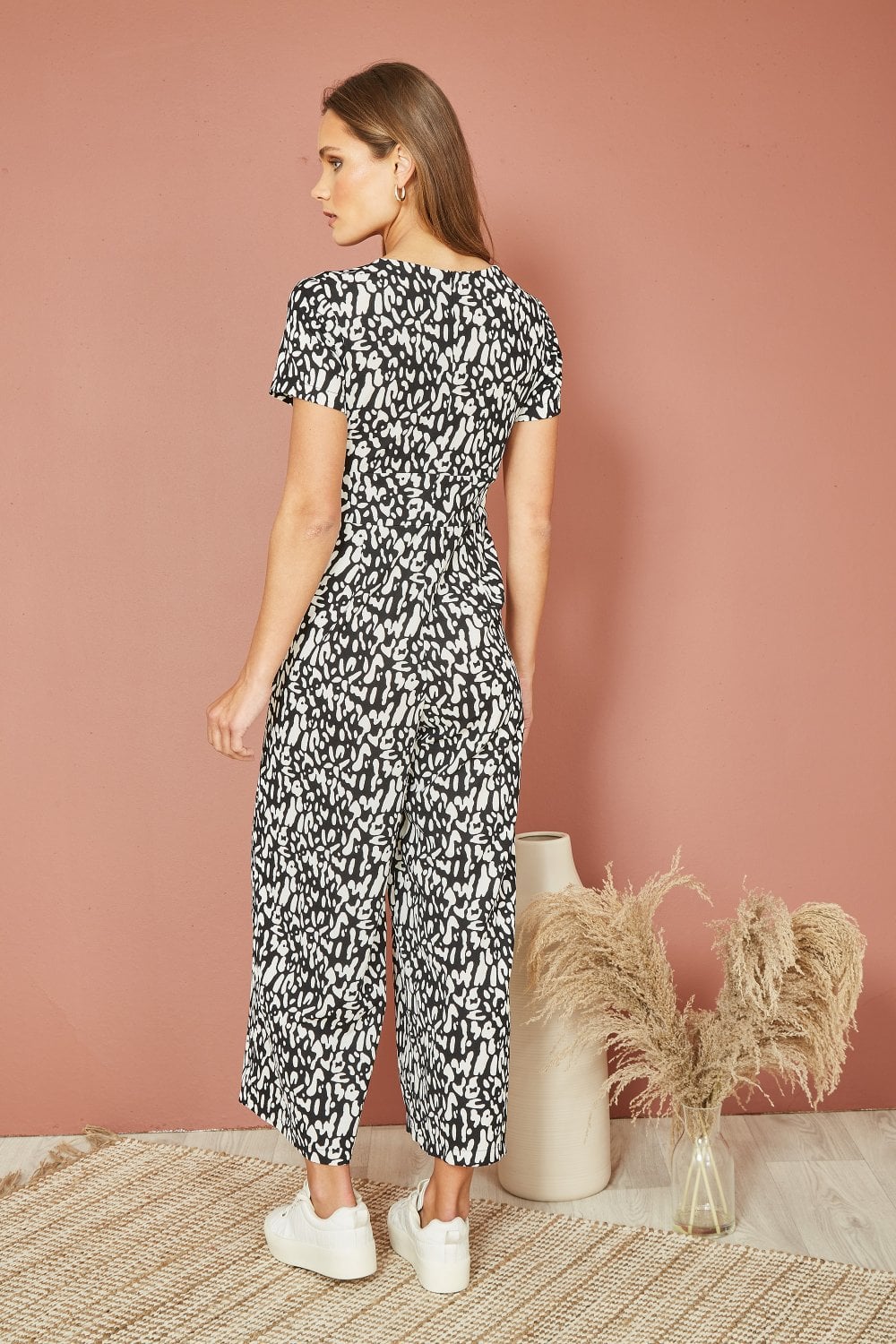 Mela Black And White Wrap Over Stretch Jumpsuit Mela