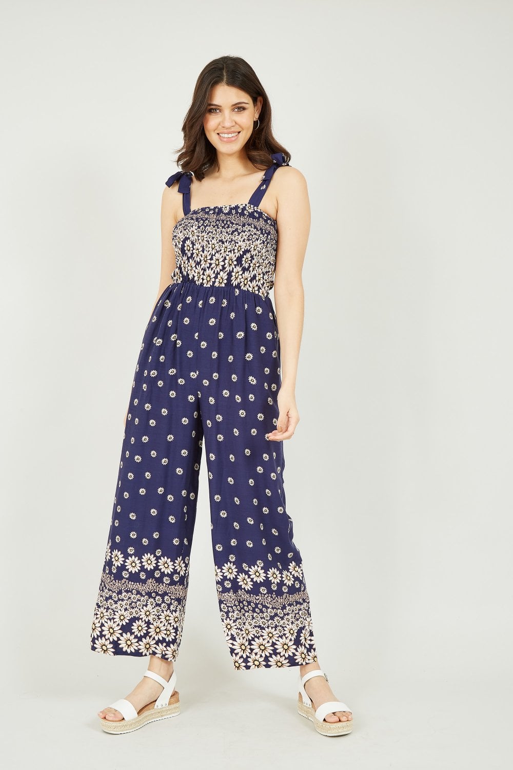 Mela Navy Daisy Border Shirred Tie Jumpsuit Mela