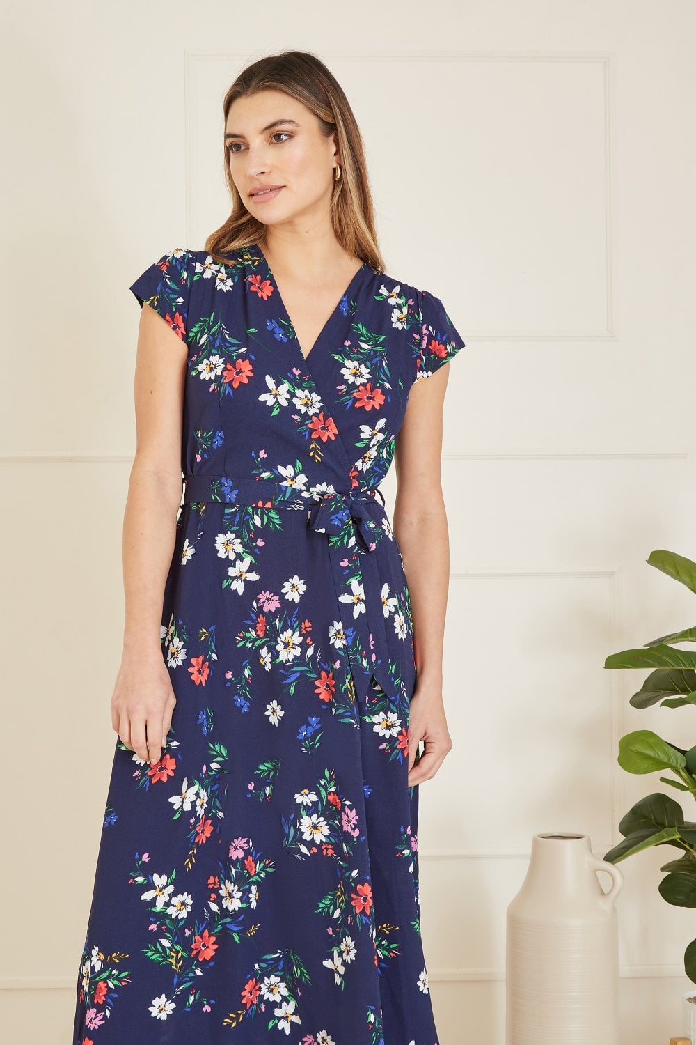 Mela Navy Daisy Print Wrap Over Midi Dress With Dipped Hem Yumi