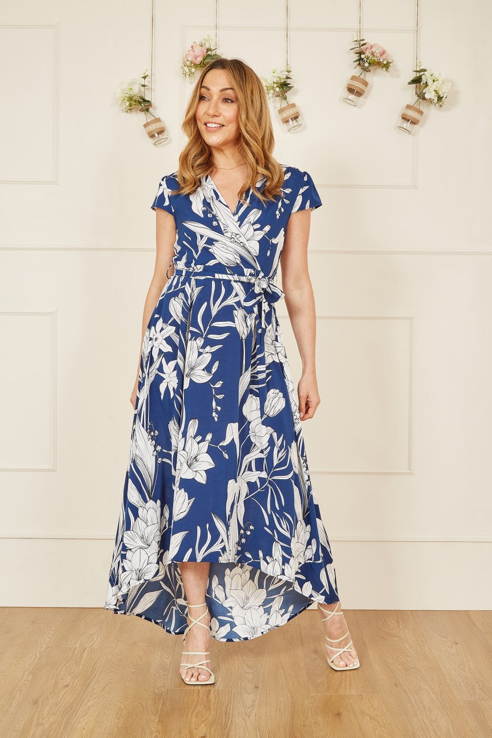 Mela Navy Leaf Print Dipped Hem Wrap Dress Yumi