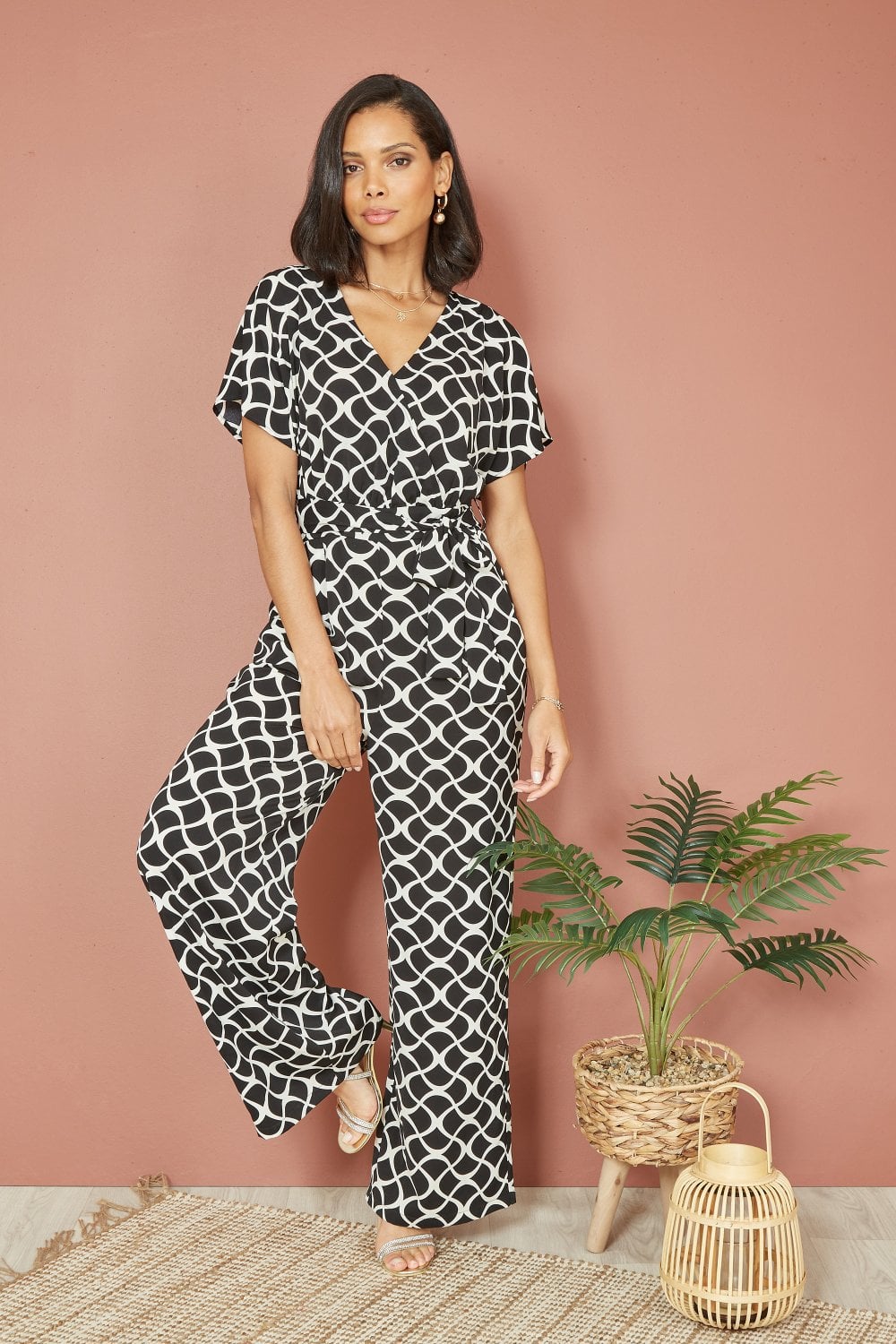 Yumi Black Geometric Print Wrap Jumpsuit Yumi