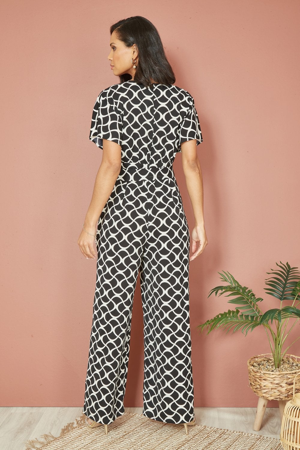 Yumi Black Geometric Print Wrap Jumpsuit Yumi