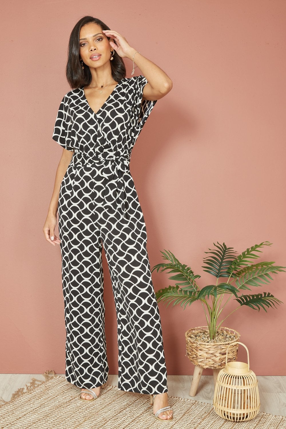 Yumi Black Geometric Print Wrap Jumpsuit Yumi