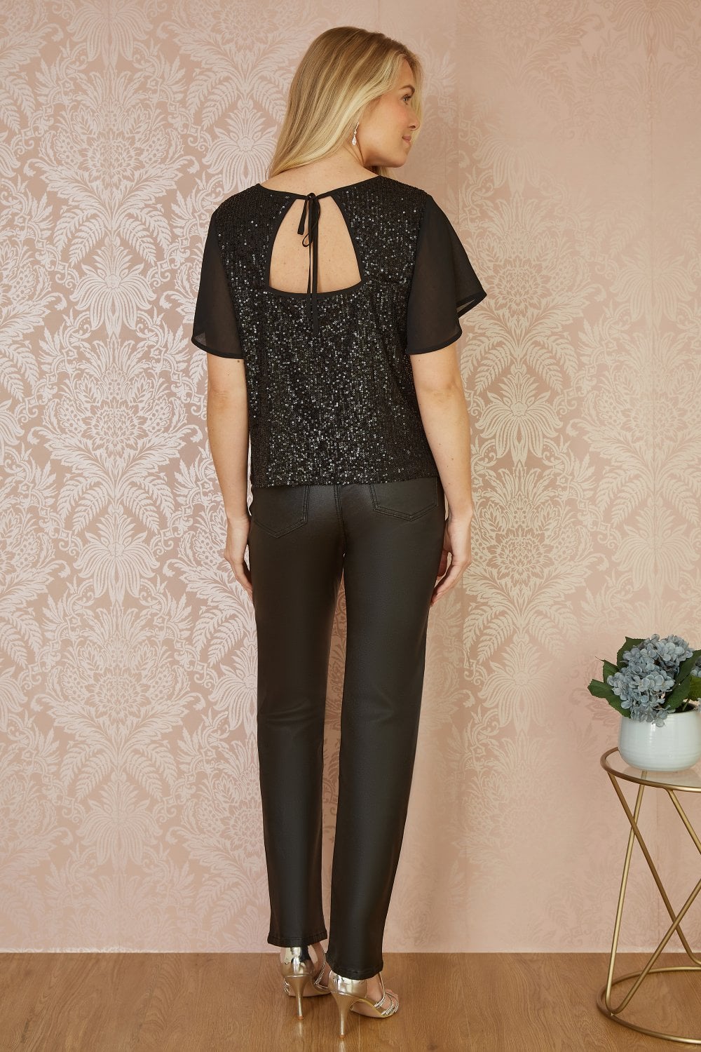 Yumi Black Sequin Top With Sheer Sleeves And Cut Out Back Yumi